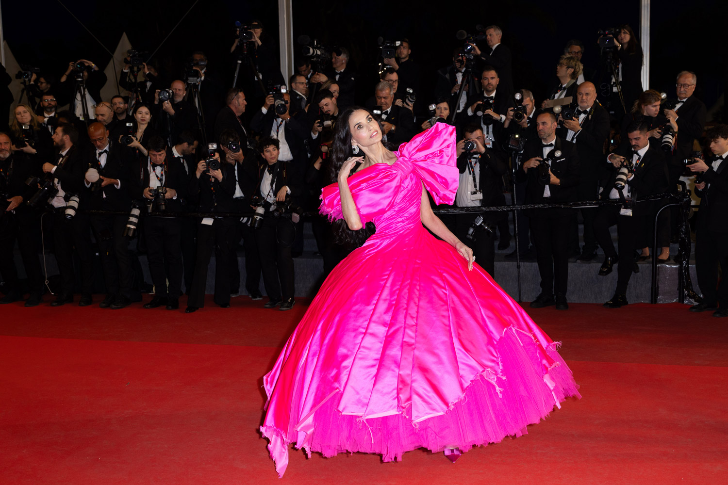 Demi Moore in Cannes in a pink gown by Matières Fécales