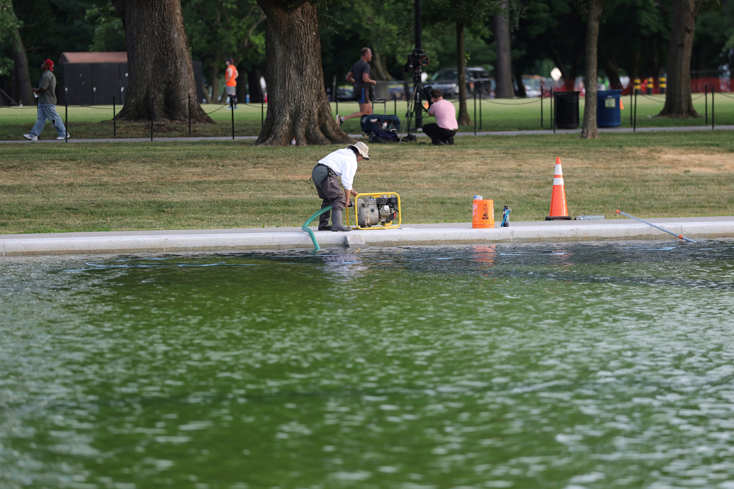 View of the Lincoln Memorial Reflecting Pool as algae has bloomed in the pool after the $14 Million Dollar renovation in Washington, D.C., 6-18-26