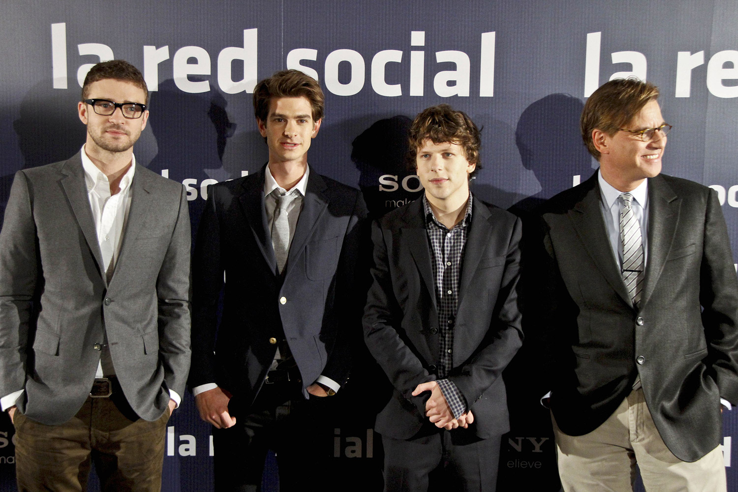 Justin Timberlake, Andrew Garfield, Jesse Eisenberg and Aaron Sorkin pose for photos together at the presentation of their new film