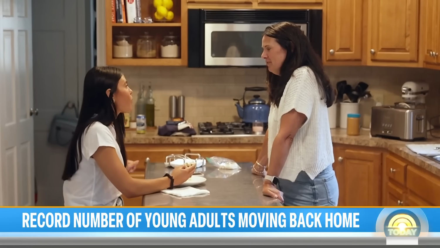 Young adult daughter and mother in a kitchen - screenshot from The Today Show