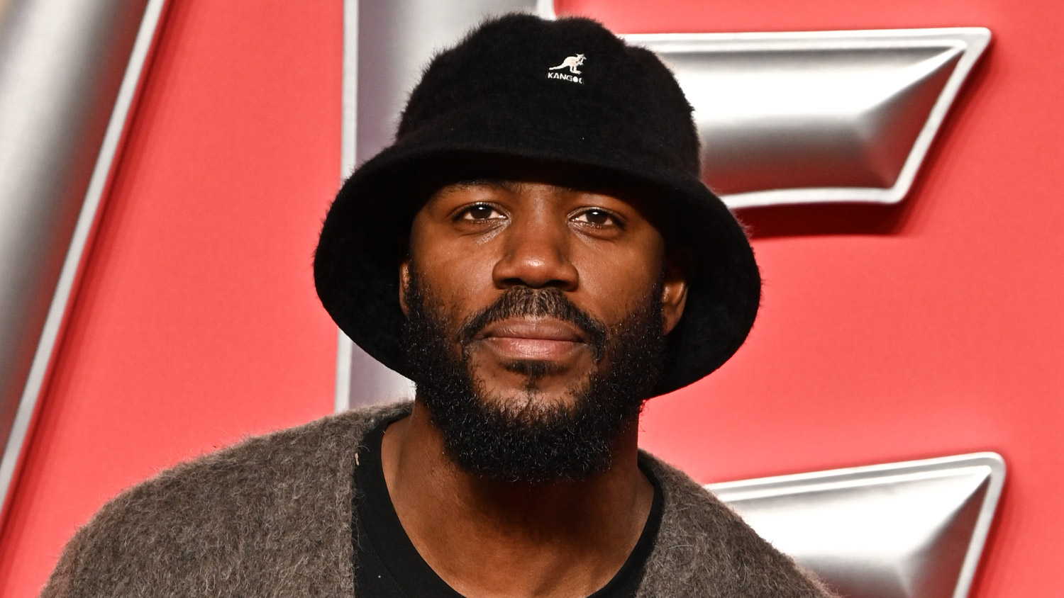 Comedian Mo Gilligan in a bucket hat at the Venom: The Last Dance UK premiere 10-23-24