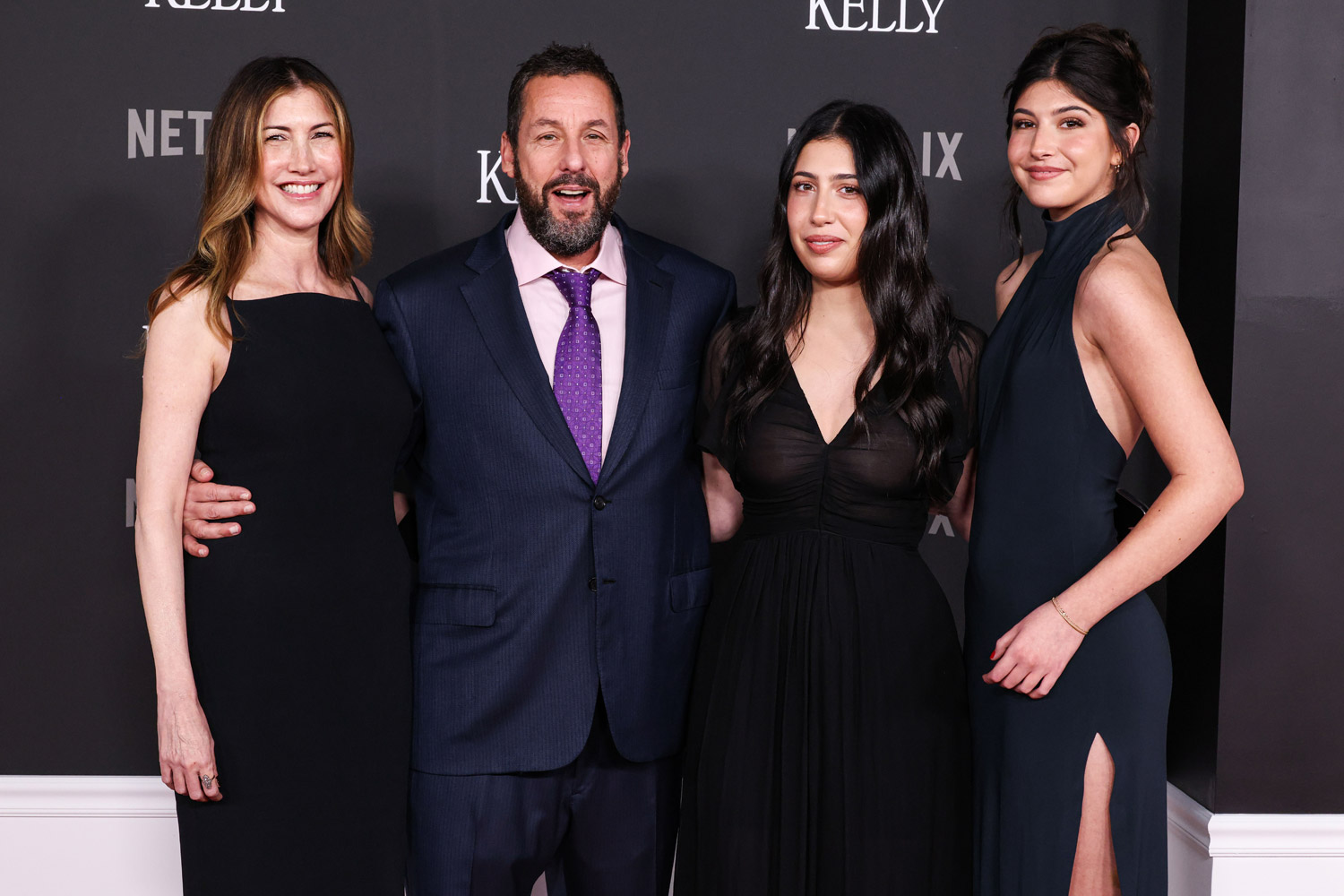 Jackie Sandler, Adam Sandler, Sadie and Sunny Sandler at the premiere of Jay Kelly on 11-25-26