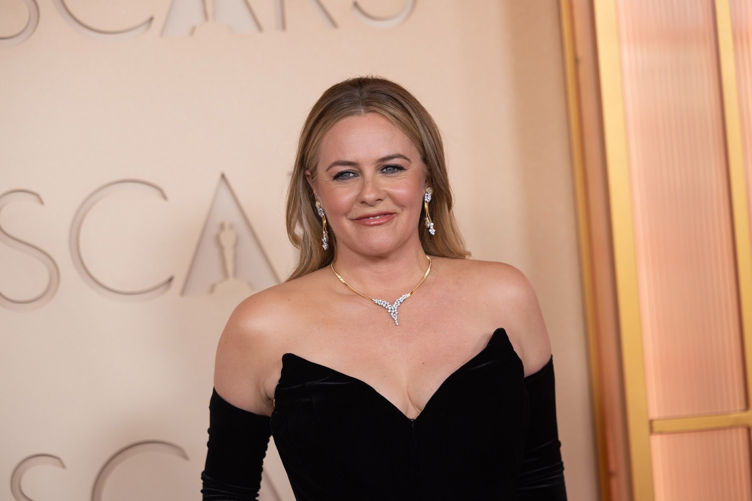 Alicia Silverstone arrives on the red carpet of the 98th Oscars at the Dolby Theatre at Ovation Hollywood on Sunday, March 15, 2026.