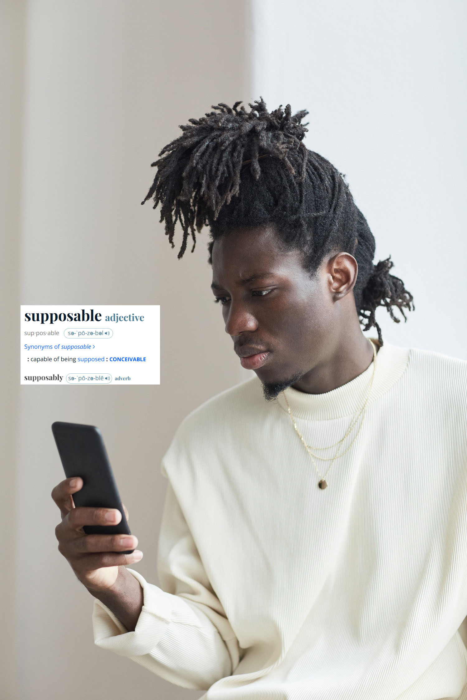Man sitting looking incredulously at his phone. The definition for "supposable" is pasted next to him