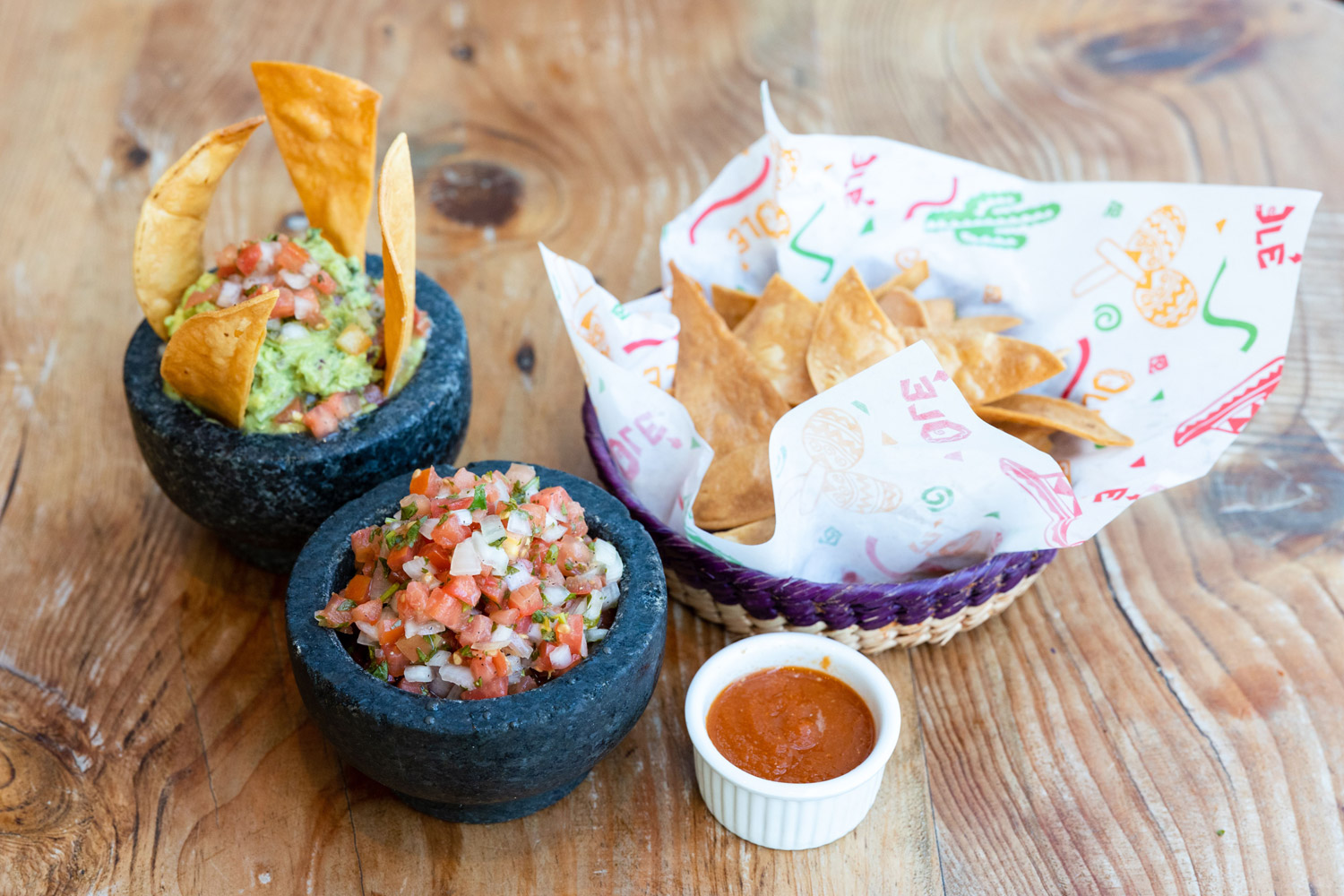 Chips, salsa and guacamole at a restaurant