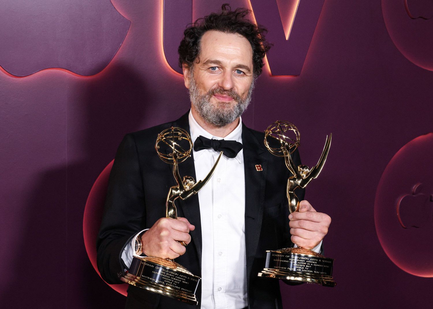 Matthew Rhys with his two Emmys