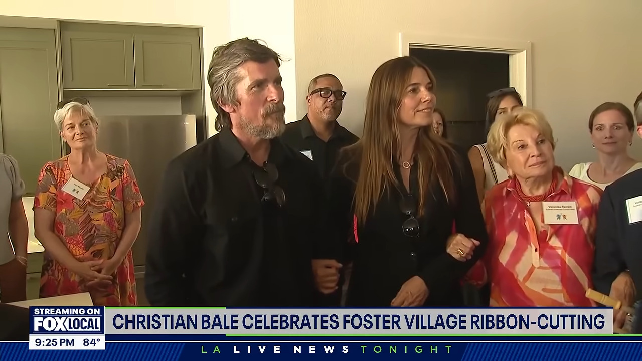Christian Bale and his wife at the ribbon cutting ceremony