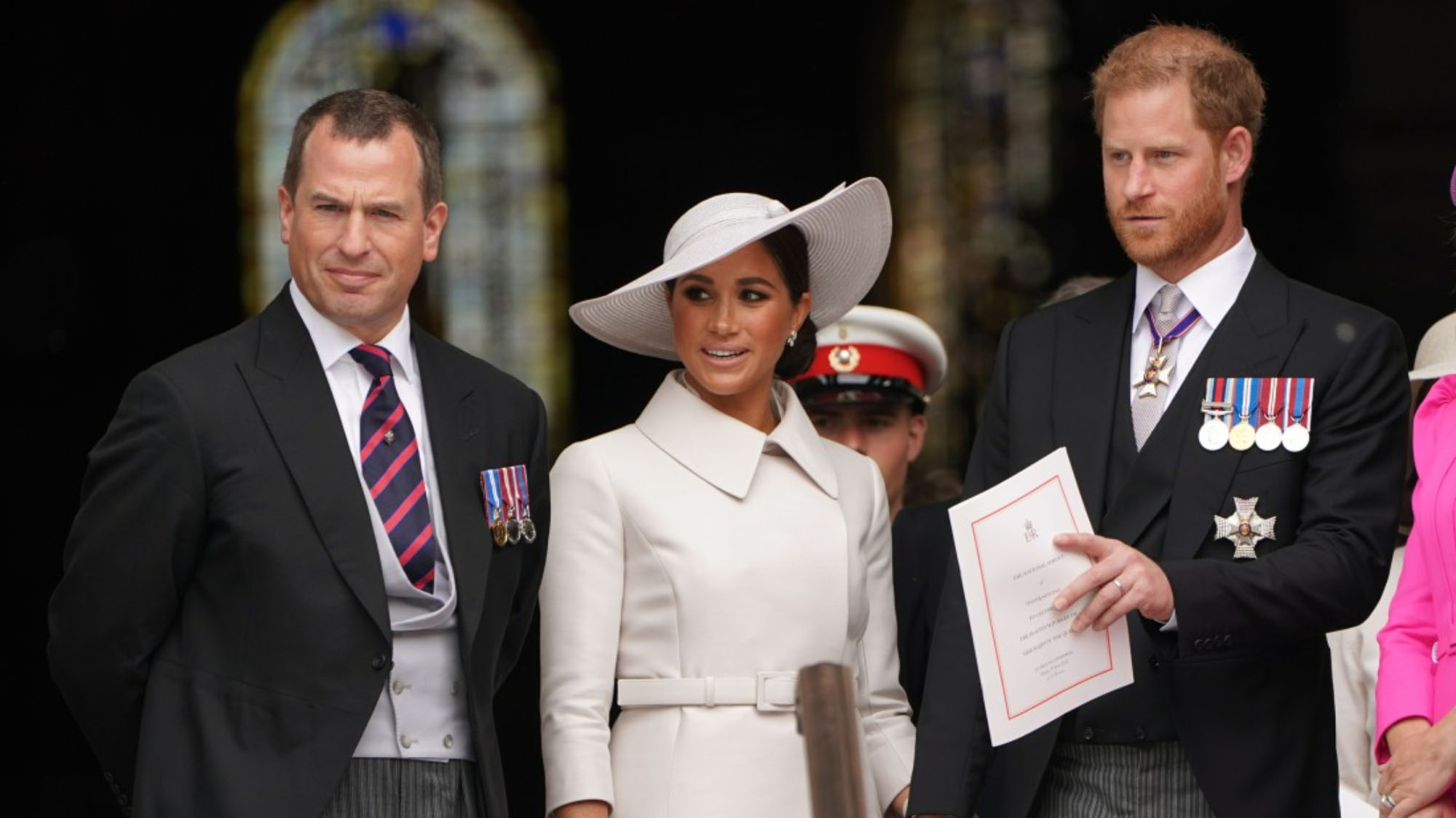 Peter Phillips, Harry and Meghan outside church
