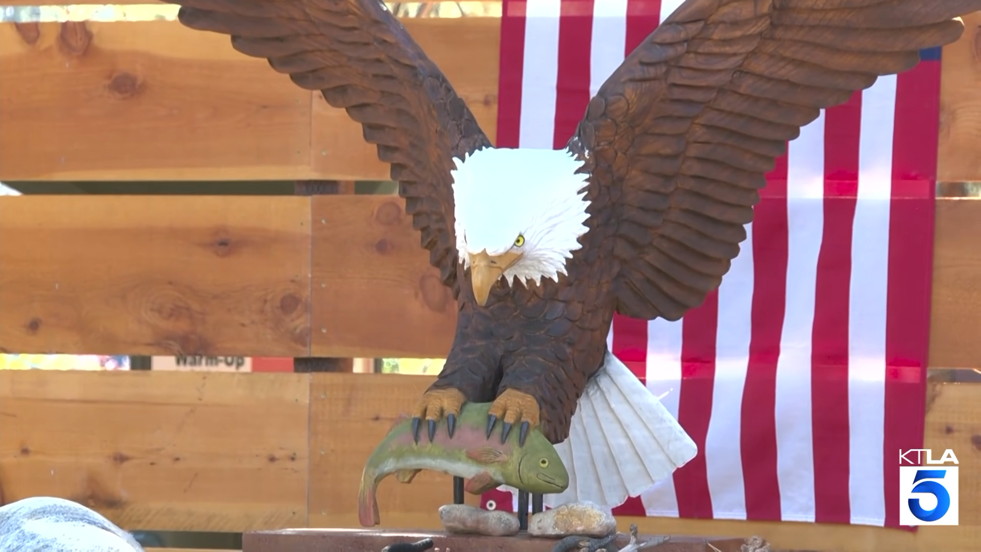 Statue of Jackie with fish in her talons