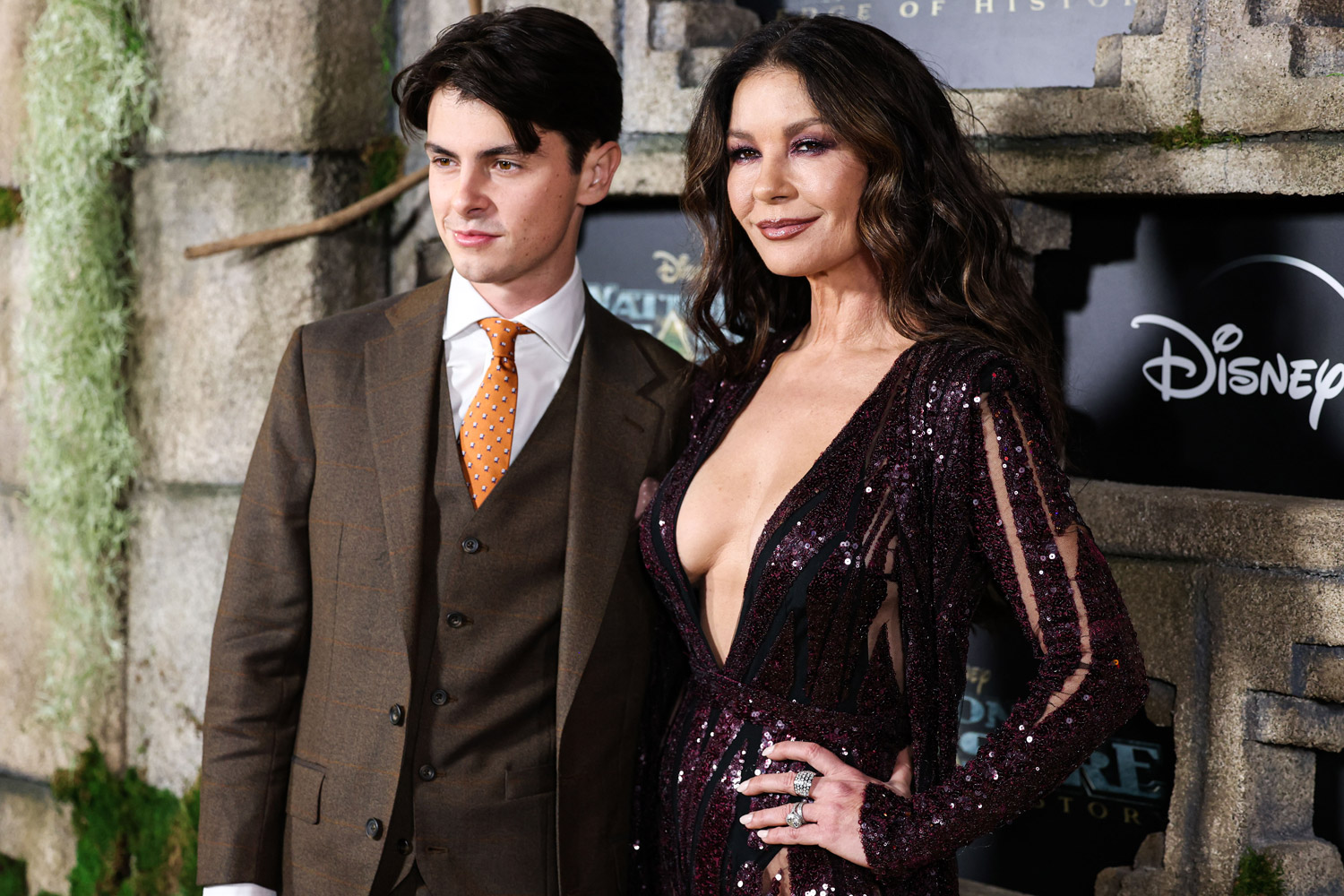 Dylan Michael Douglas and mother Catherine Zeta-Jones arrive at the Disney+ Original Series National Treasure: Edge Of History Season 1, 12-5-22