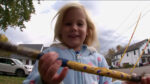 Little girl saying her stick had lichen on it