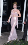 Florence Pugh in a pink slip dress. The bust area is blurred